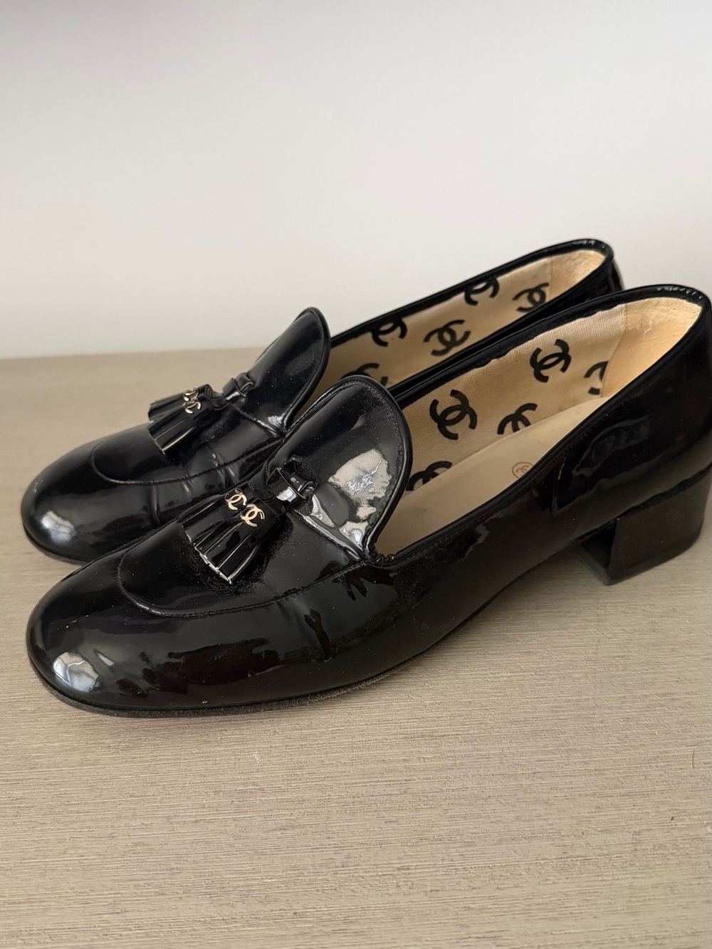 CHANEL Black Patent Leather Tassel Loafers with Gold CC Hardware - Size 40